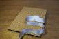 Preview: Light brown mini photo book with cream flowers and silver satin bow
